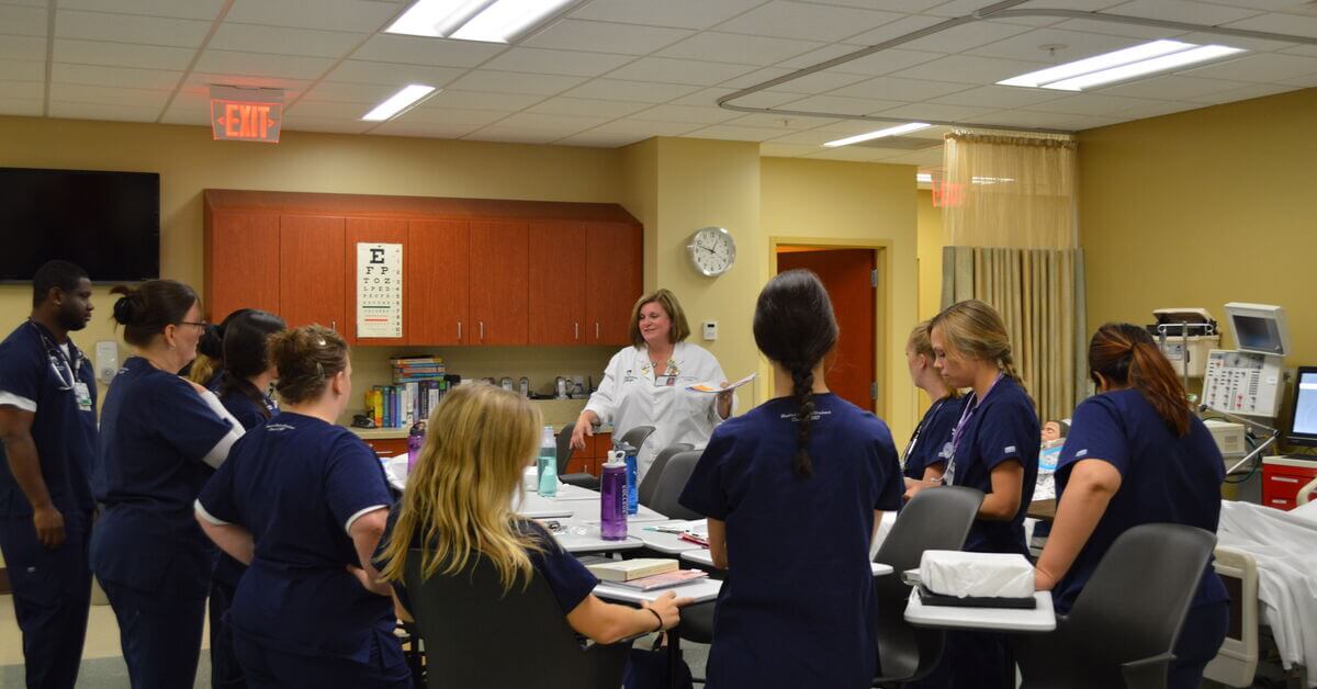 Elmhurst University nursing students and teacher